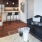 a living room with a couch and a table